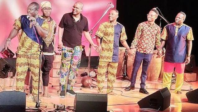 Dela Botri (holding mic), Winchester Nii Tete (right), Aaron Bebe (third from right) and some music fans on stage in Japan. When Ghana thrilled Japan with music